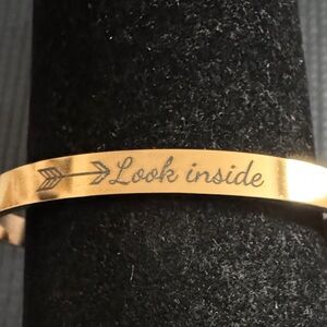 Gold Engraved Bracelet with engraved messages.